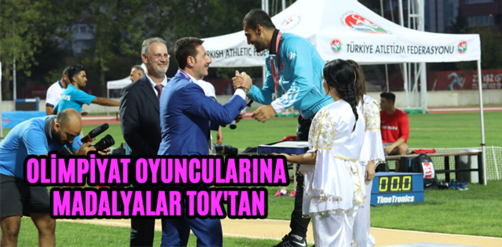 OLİMPİYAT OYUNCULARINA MADALYALAR TOK'TAN