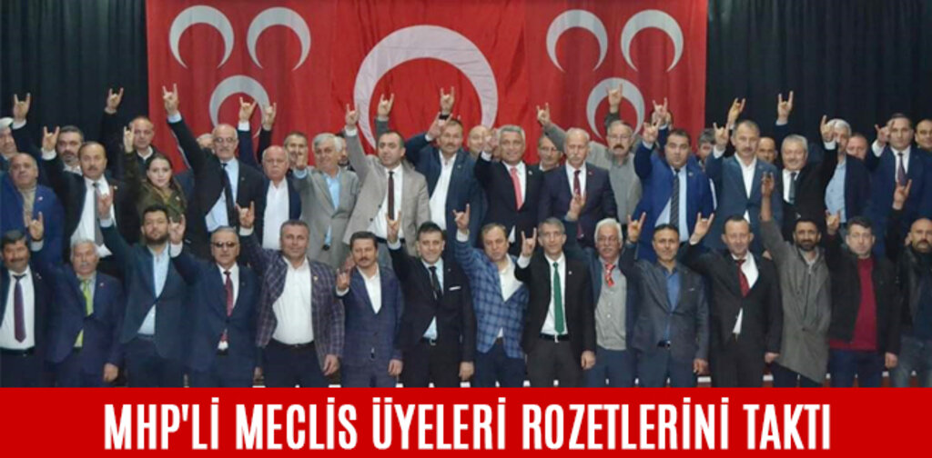 MHP'Lİ MECLİS ÜYELERİ ROZETLERİNİ TAKTI