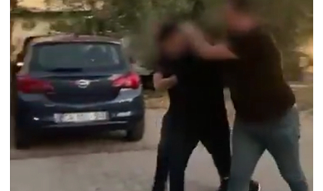 Türk polisi yakalar: Çocuklarının yanında babaya tokat atan şahıs yakalandı